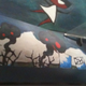 Illustration for article titled Japanese graffiti artist adds Fukushima disaster to famous A-bomb mural